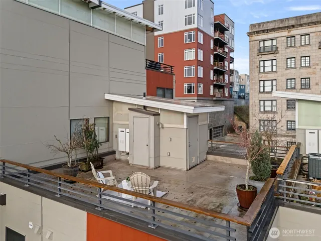 a view of a kitchen with a sink and cabinets