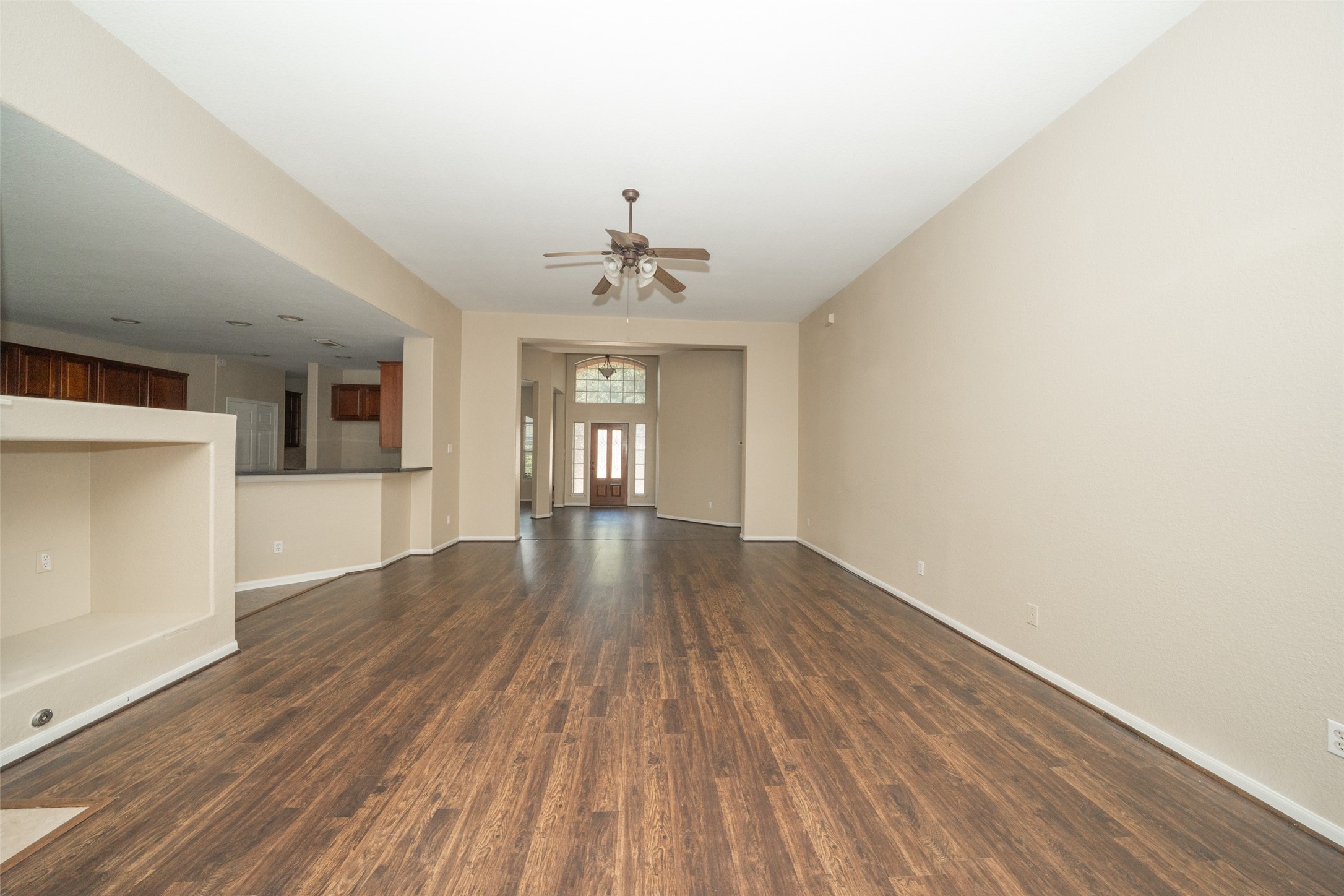 14410 Floret Estates Lane Cypress, TX 77429 - Photo 15 of 27 wooden floor in an empty room with a window