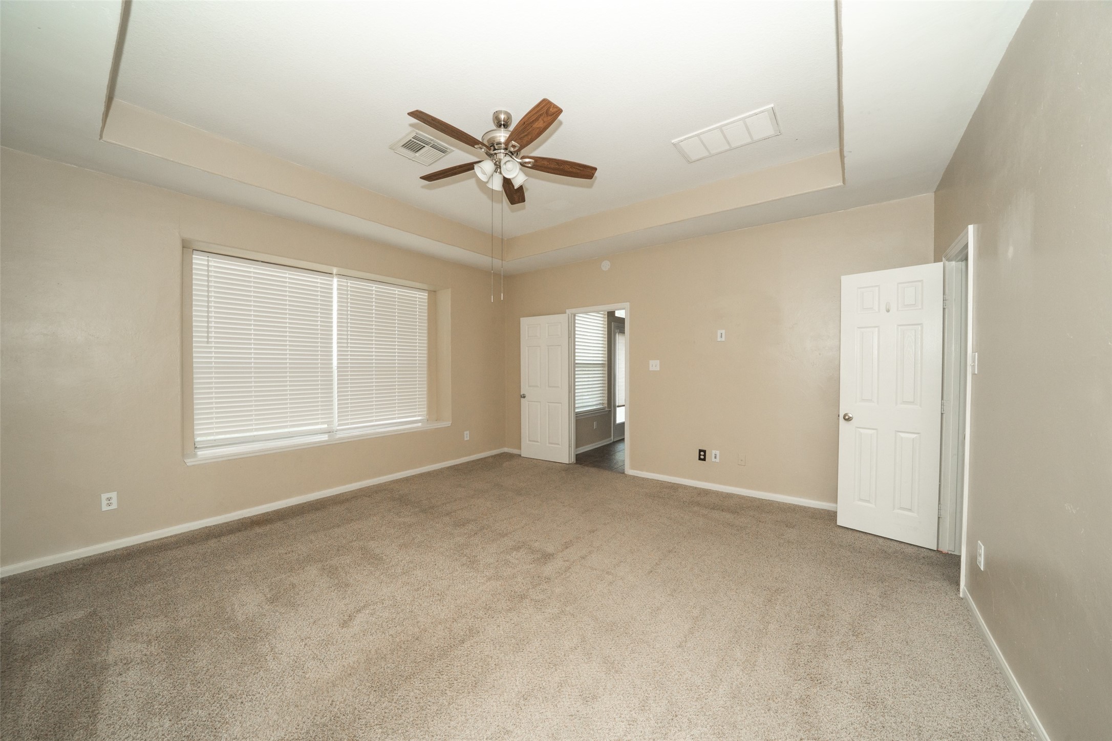 14410 Floret Estates Lane Cypress, TX 77429 - Photo 20 of 27 a view of an empty room with a window