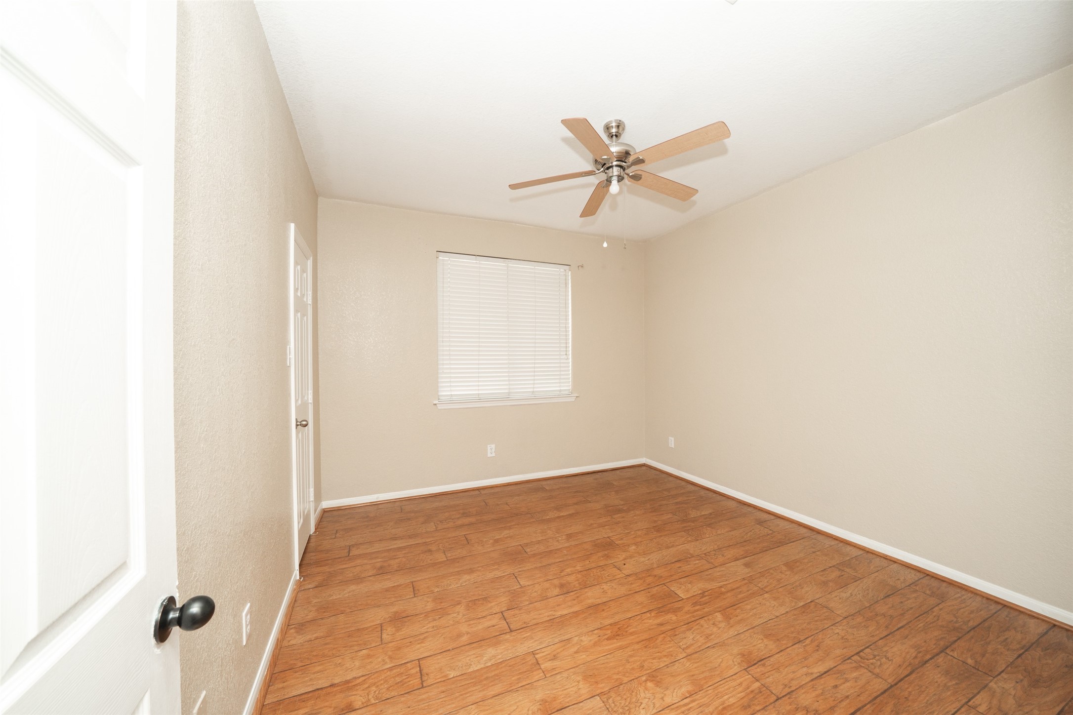 14410 Floret Estates Lane Cypress, TX 77429 - Photo 22 of 27 wooden floor in an empty room