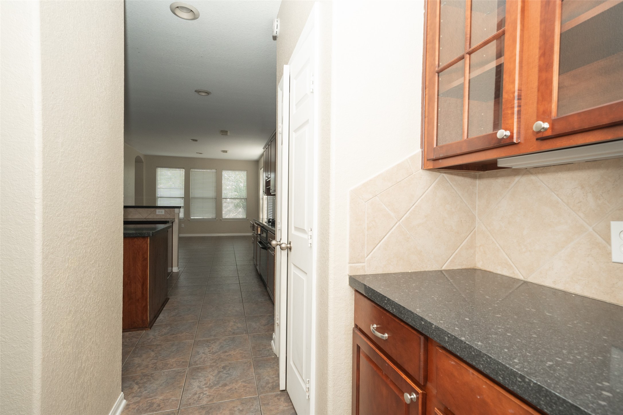 14410 Floret Estates Lane Cypress, TX 77429 - Photo 9 of 27 a view of a kitchen cabinets and a window