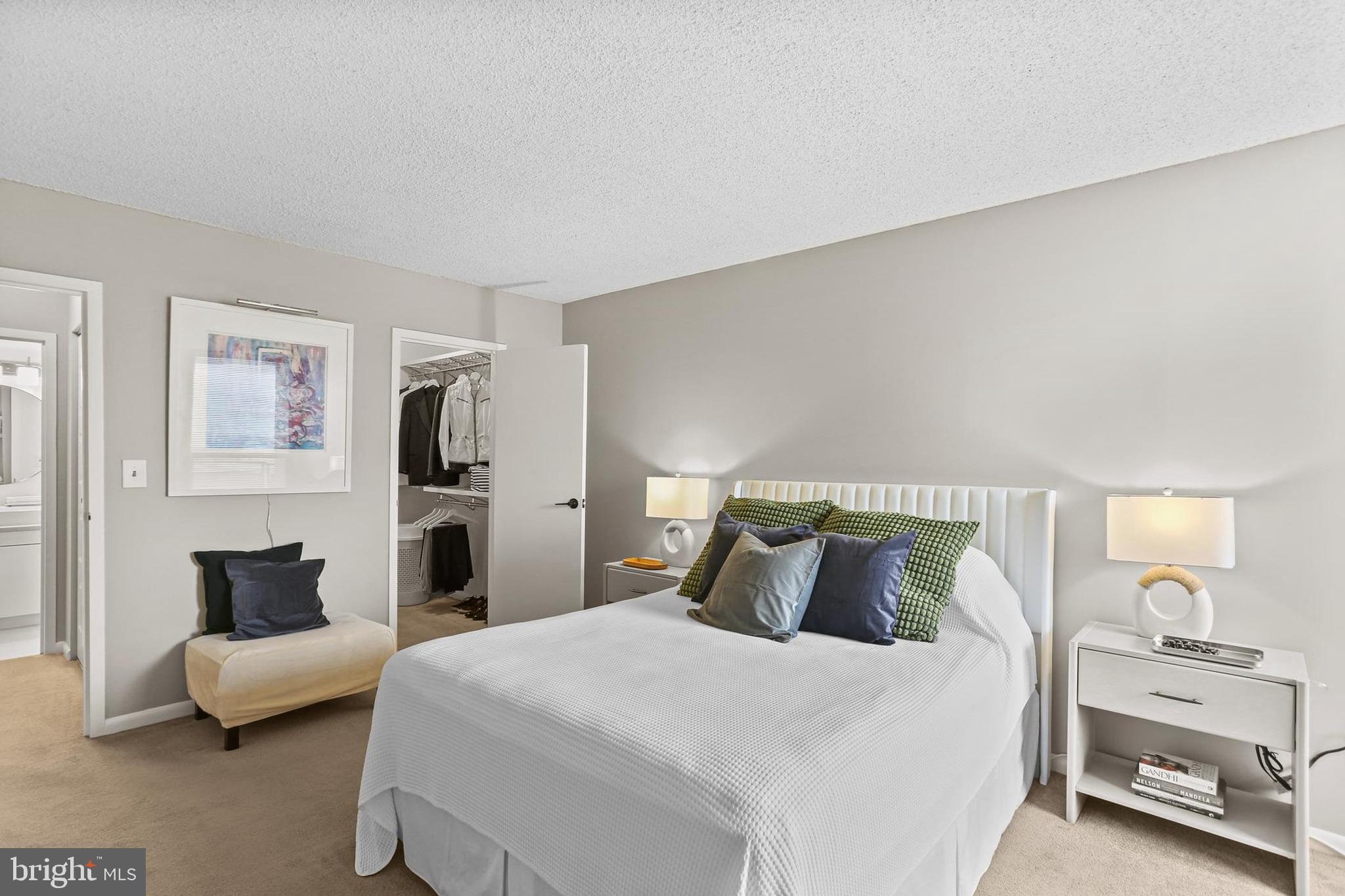 205 East Joppa Road, Unit 1907 Towson, MD 21286 - Photo 14 of 33 a bedroom with a bed and a couch