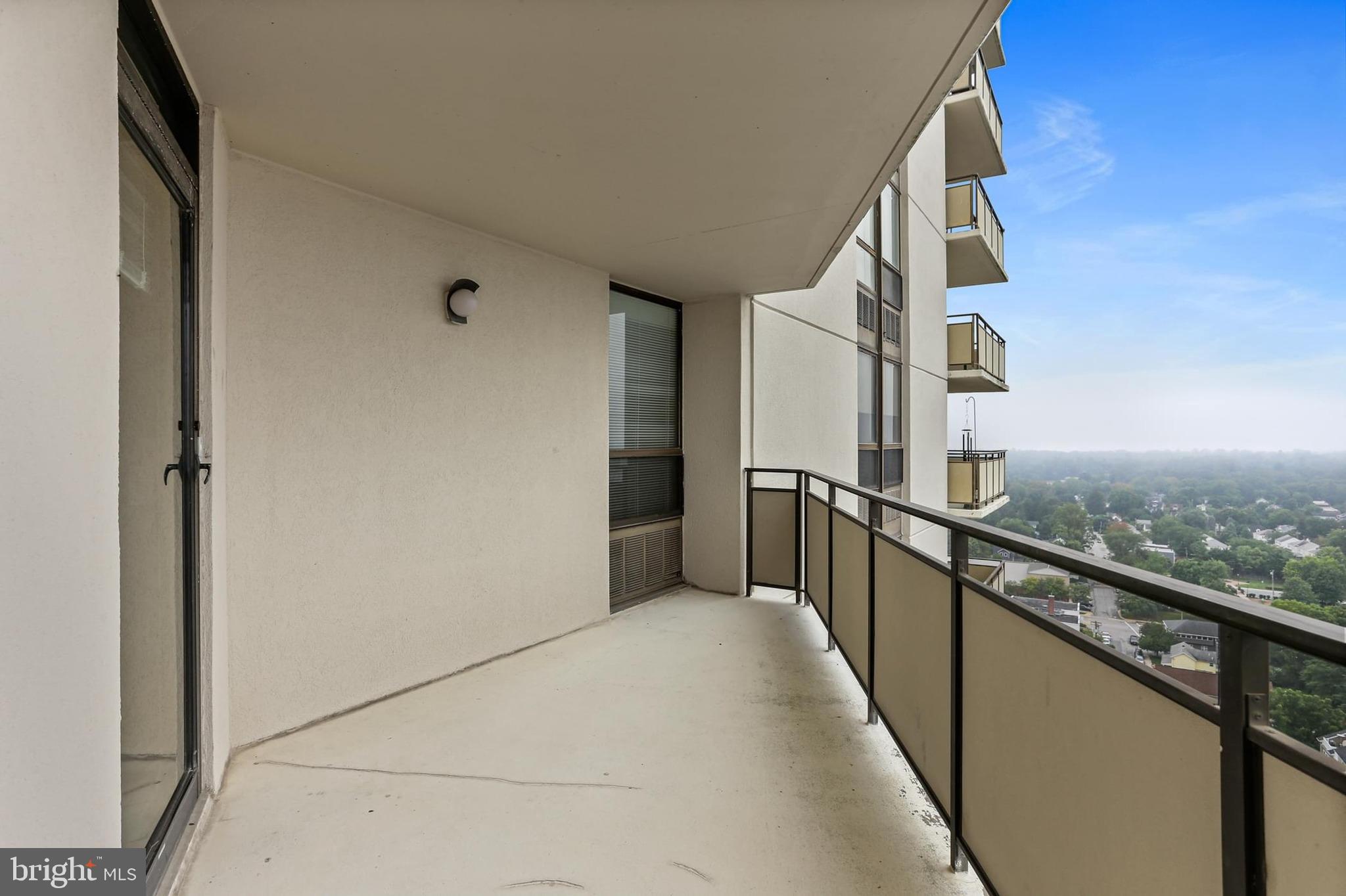 205 East Joppa Road, Unit 1907 Towson, MD 21286 - Photo 21 of 33 a view of balcony and wooden floor
