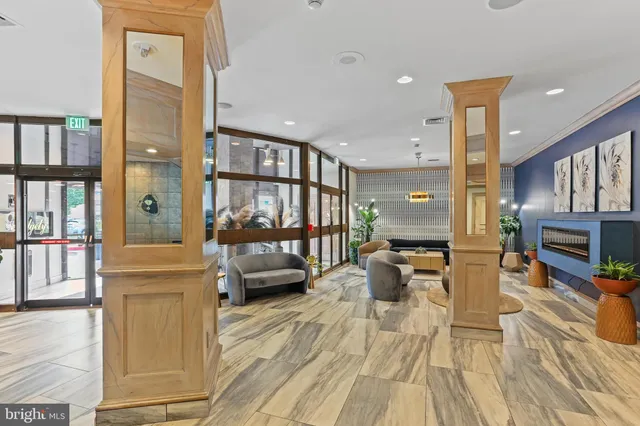 a view of a living room and entry way