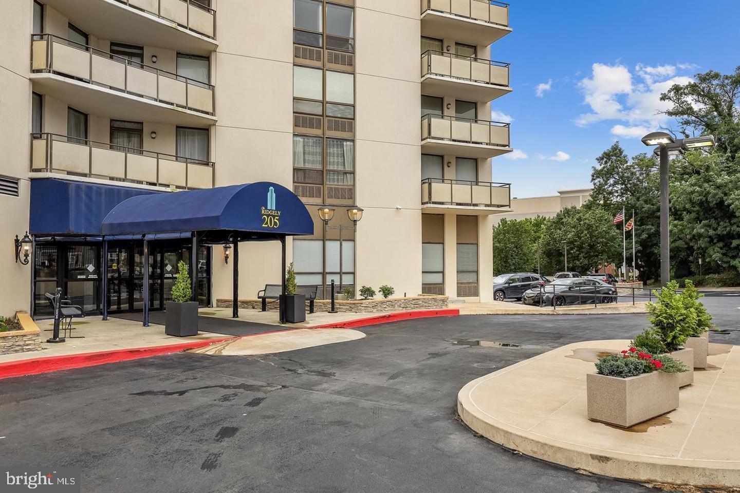 205 East Joppa Road, Unit 1907 Towson, MD 21286 - Photo 3 of 33 a view of building with street