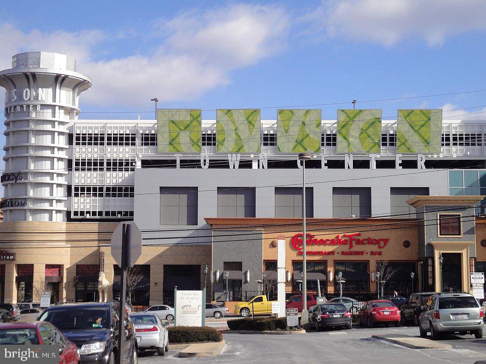 205 East Joppa Road, Unit 1907 Towson, MD 21286 - Photo 33 of 33 a view of building with cars parked in front of it
