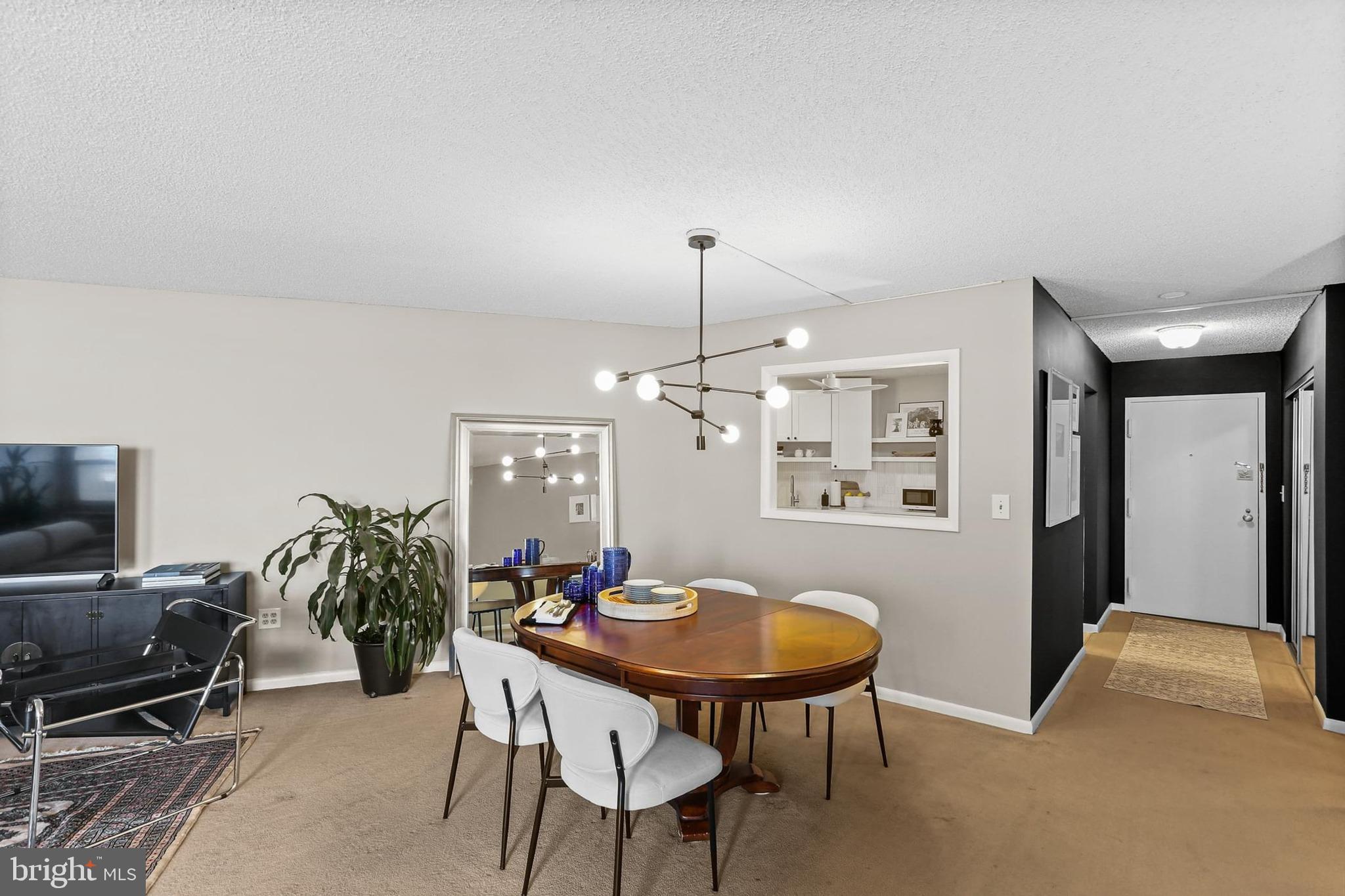 205 East Joppa Road, Unit 1907 Towson, MD 21286 - Photo 4 of 33 a view of a dining room with furniture