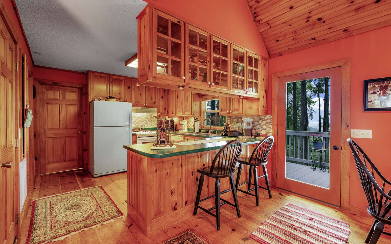 1003 Walnut Ridge Ellijay, GA 30536 - Photo 8 of 51 a kitchen with a dining table and chairs