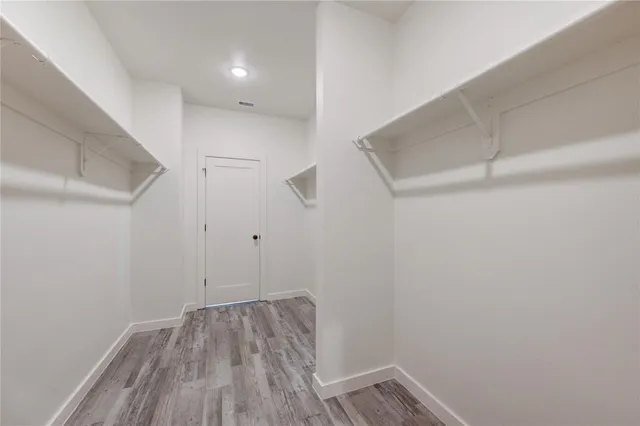 a view of small space with racks on the wall