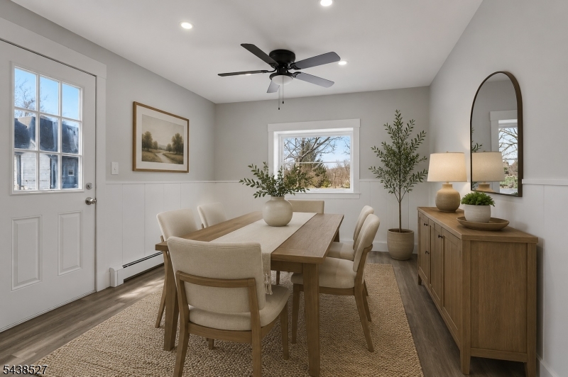 83 Highway 15 Lafayette, NJ 07848 - Photo 7 of 20 a view of a dining room with furniture and a chandelier