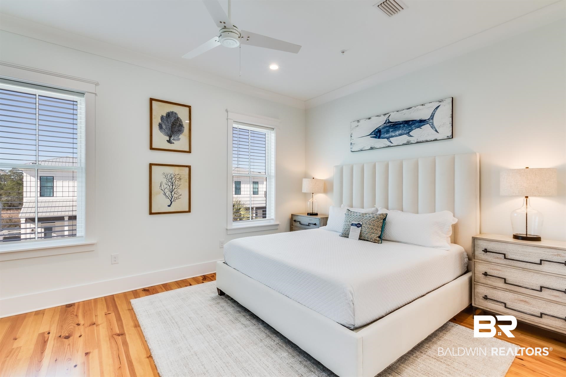 2494 Saltgrass Way Orange Beach, AL 36561 - Photo 14 of 37 Bedroom with hardwood / wood-style flooring, ornamental molding, and ceiling fan