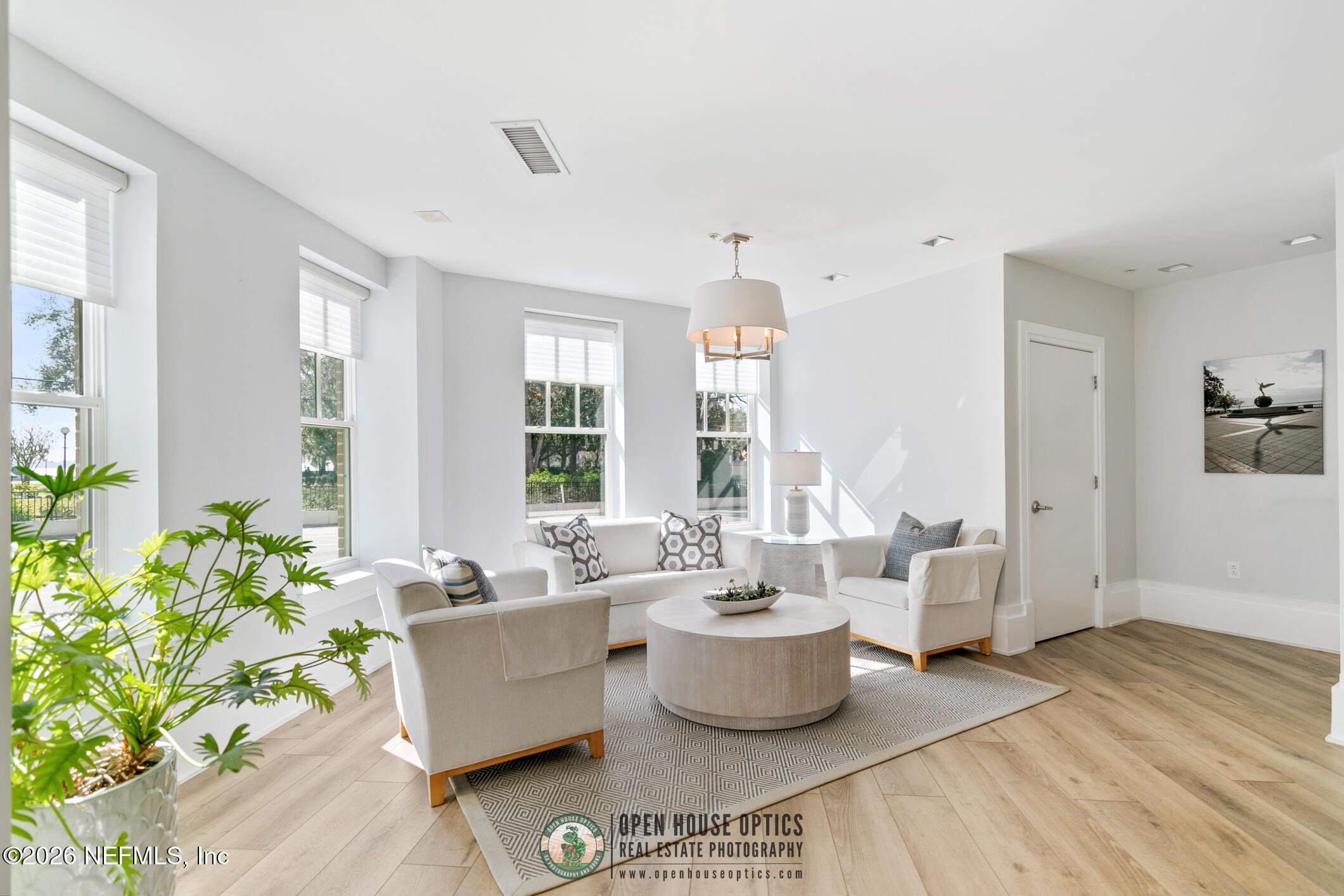1661 Riverside Avenue, Unit 407 Jacksonville, FL 32204 - Photo 36 of 60 a living room with furniture and a large window