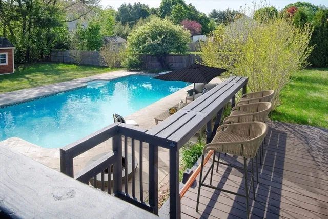 a balcony with chairs