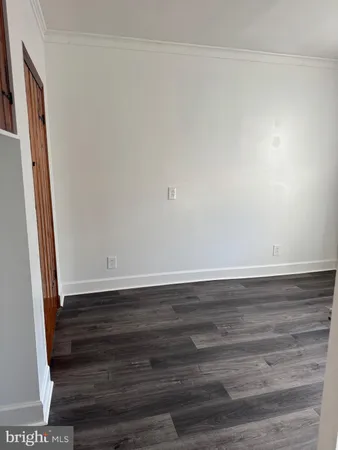 a view of wooden floor and staircase