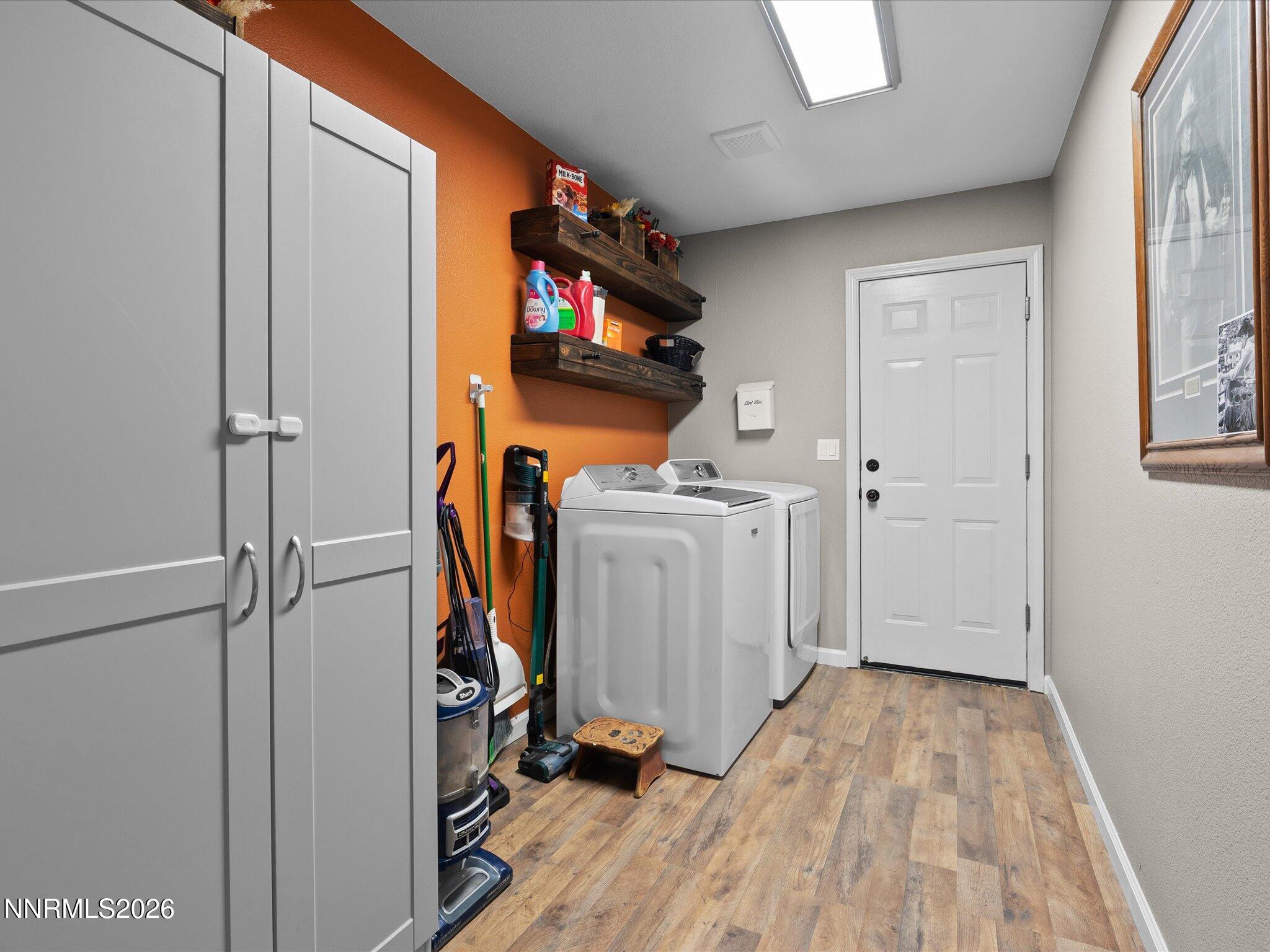 668 Farm Circle Fernley, NV 89408 - Photo 21 of 46 a view of a storage & utility room with closet dryer and washer