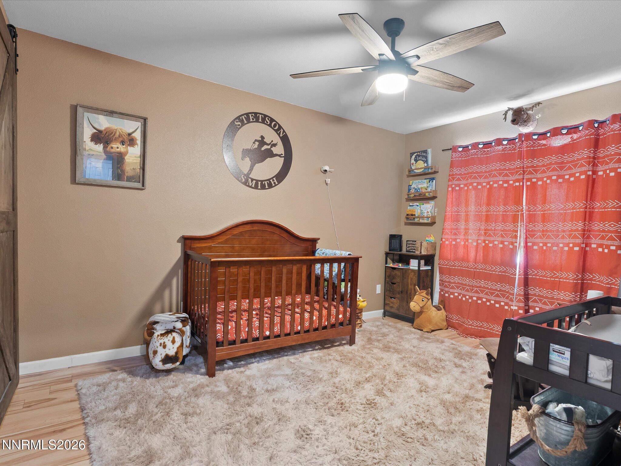 668 Farm Circle Fernley, NV 89408 - Photo 27 of 46 a view of a livingroom with furniture and a fan