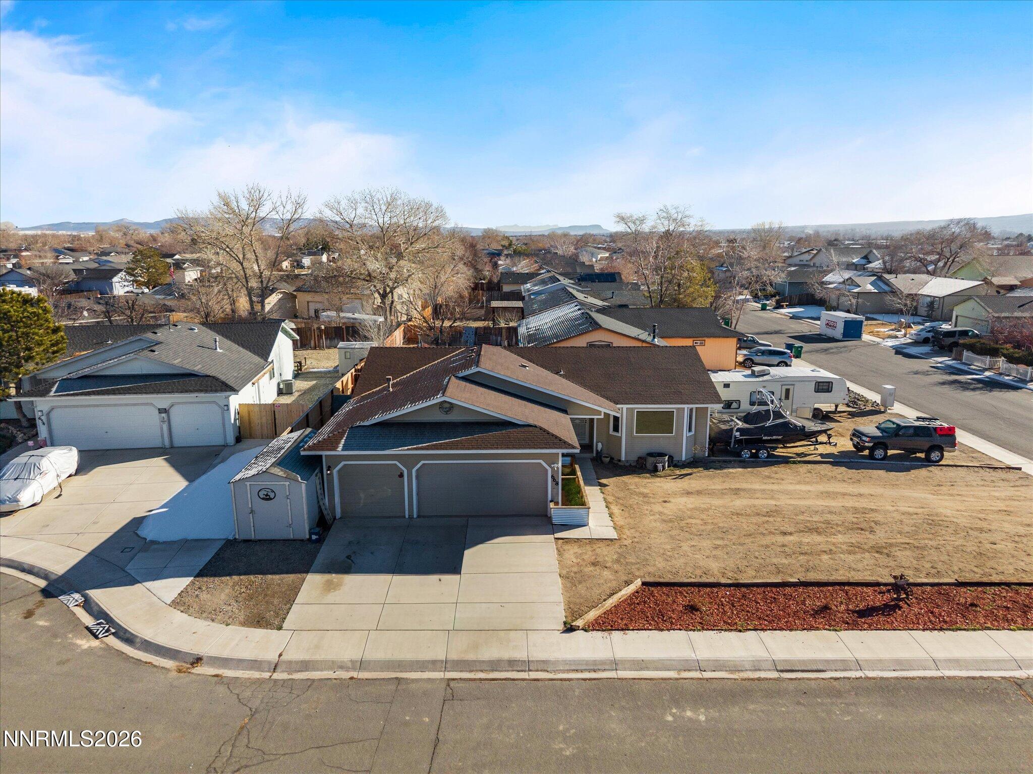668 Farm Circle Fernley, NV 89408 - Photo 36 of 46 a view of a city with big houses