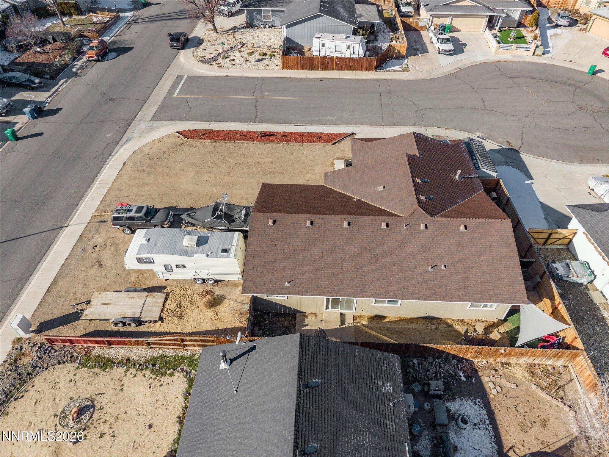 668 Farm Circle Fernley, NV 89408 - Photo 39 of 46 an aerial view of residential houses with outdoor space