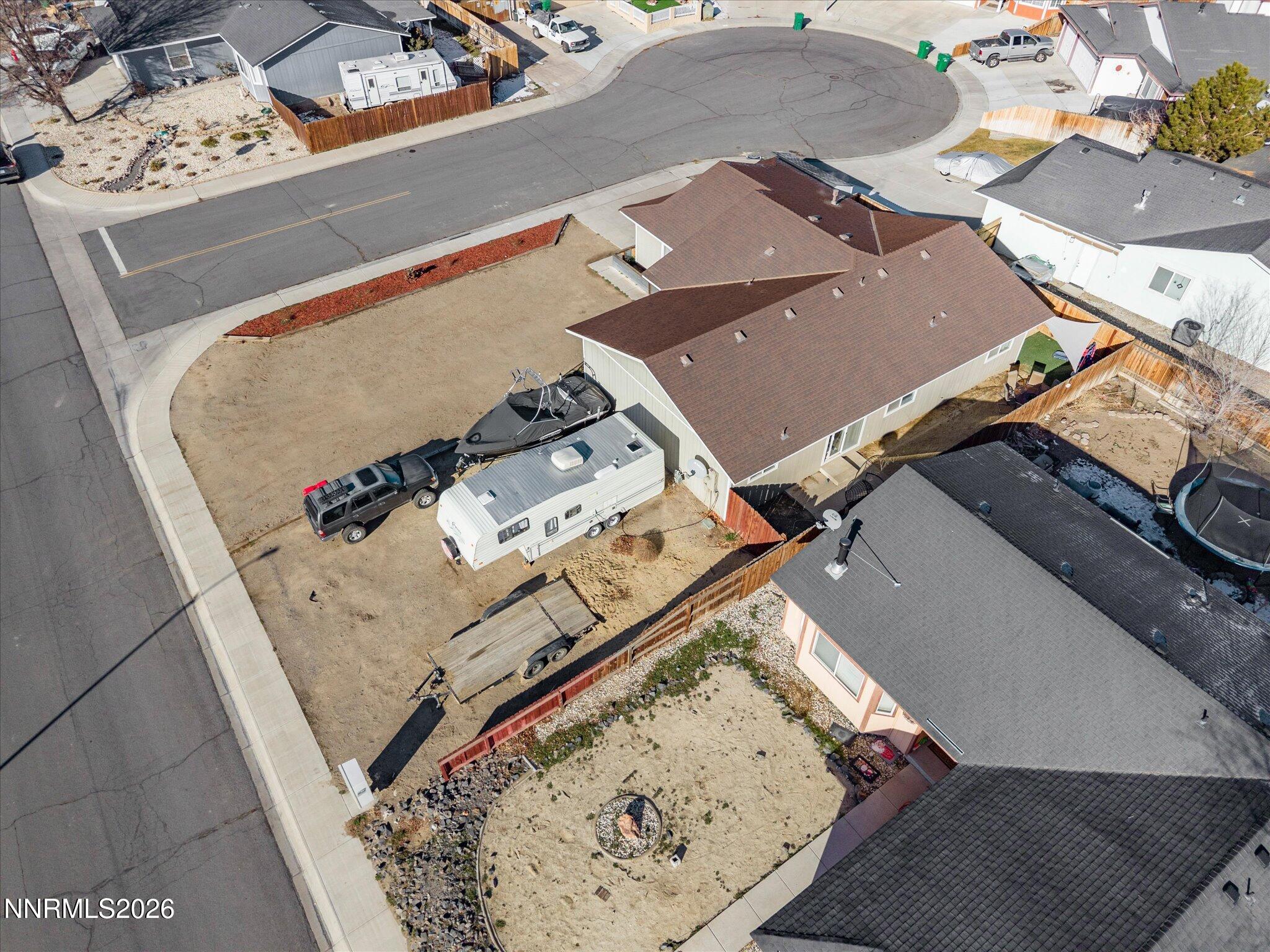 668 Farm Circle Fernley, NV 89408 - Photo 41 of 46 an aerial view of residential houses with wooden floor