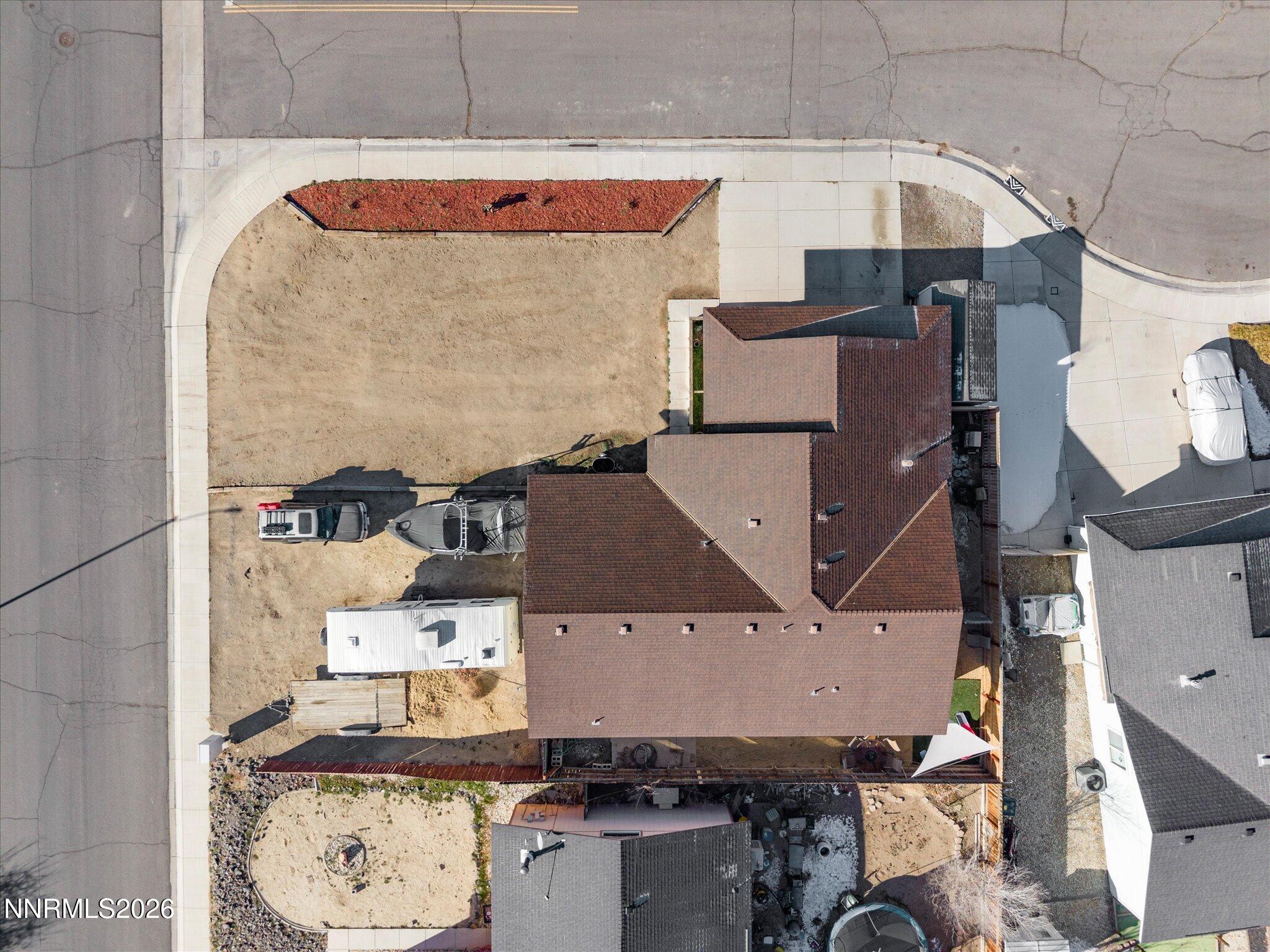 668 Farm Circle Fernley, NV 89408 - Photo 42 of 46 an aerial view of a house with a swimming pool
