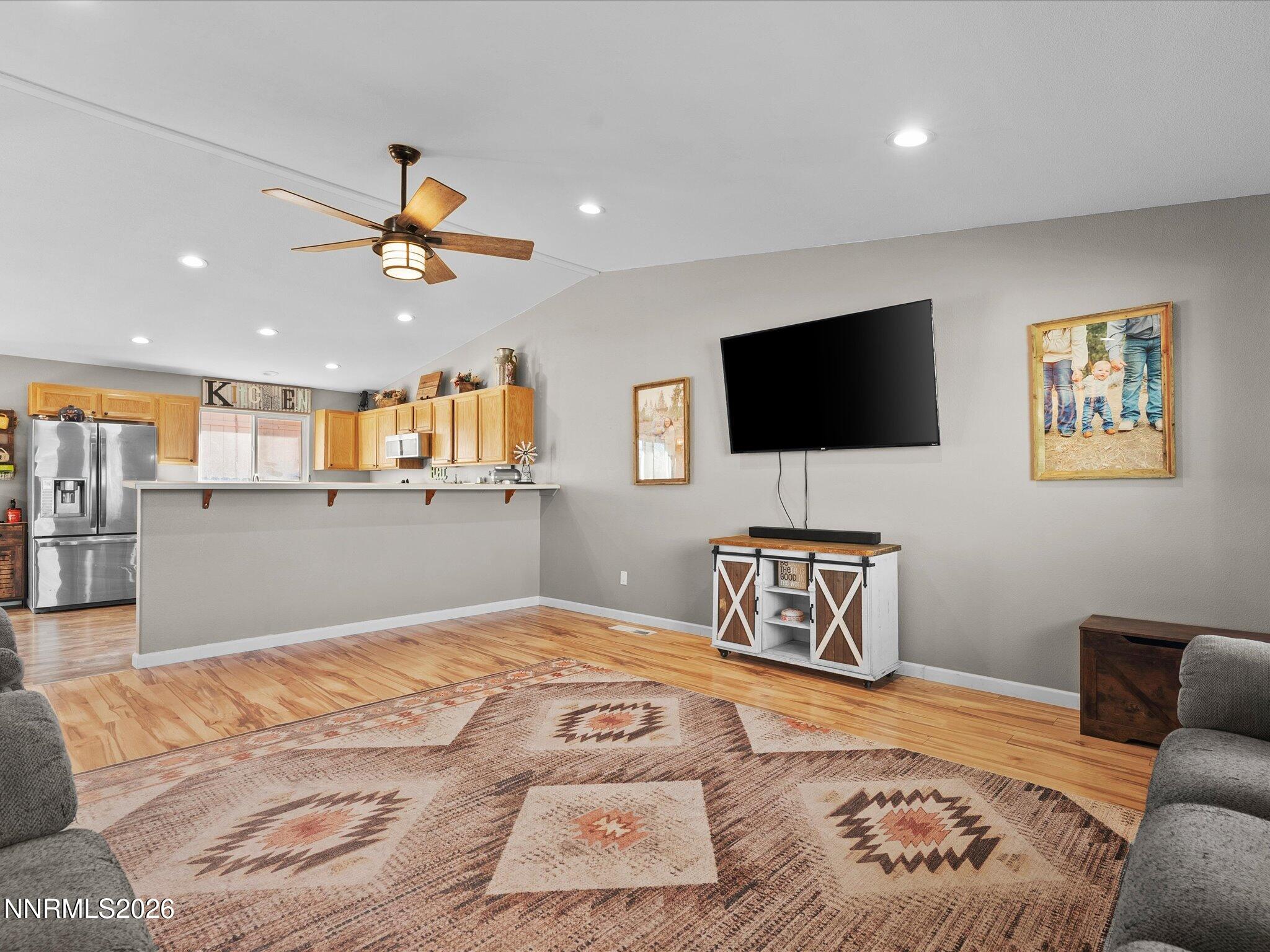 668 Farm Circle Fernley, NV 89408 - Photo 10 of 46 a bedroom with a bed and a flat screen tv