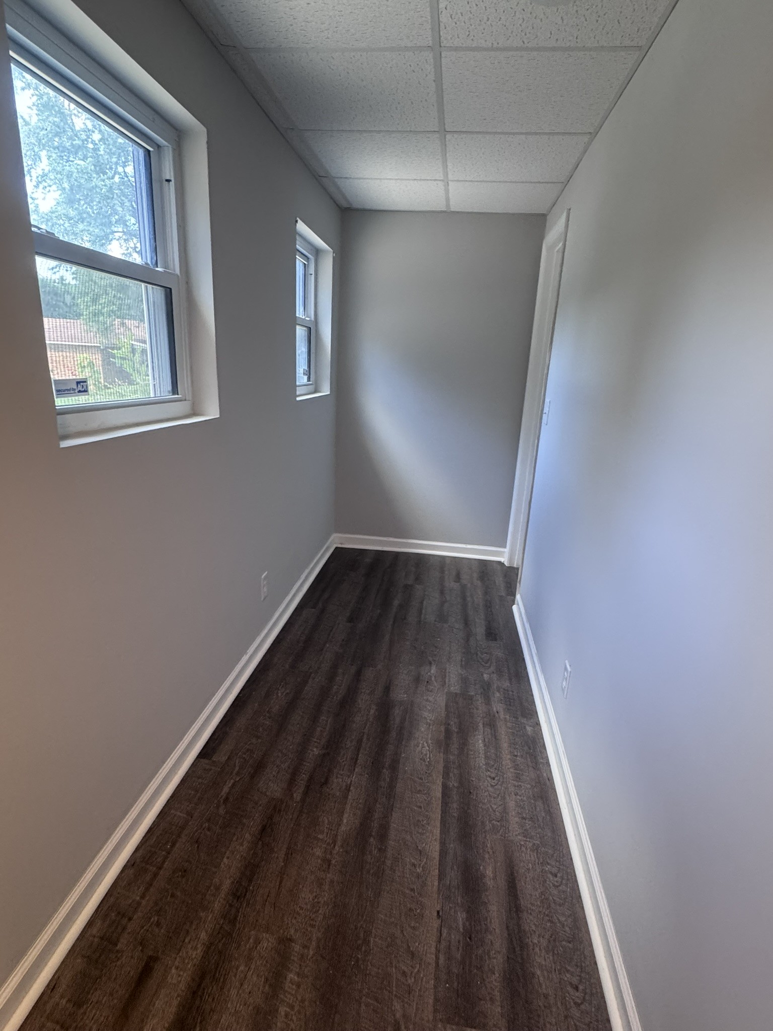 236 Raintree Drive Clarksville, TN 37042 - Photo 14 of 19 wooden floor in an empty room with a window
