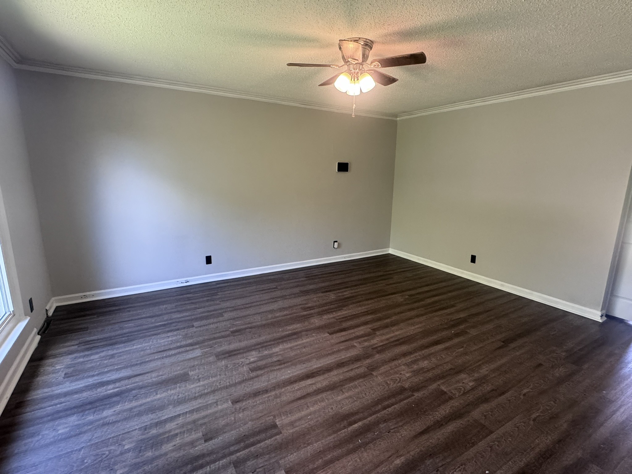 236 Raintree Drive Clarksville, TN 37042 - Photo 3 of 19 an empty room with wooden floor and windows