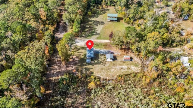 a swimming pool view with a outdoor seating