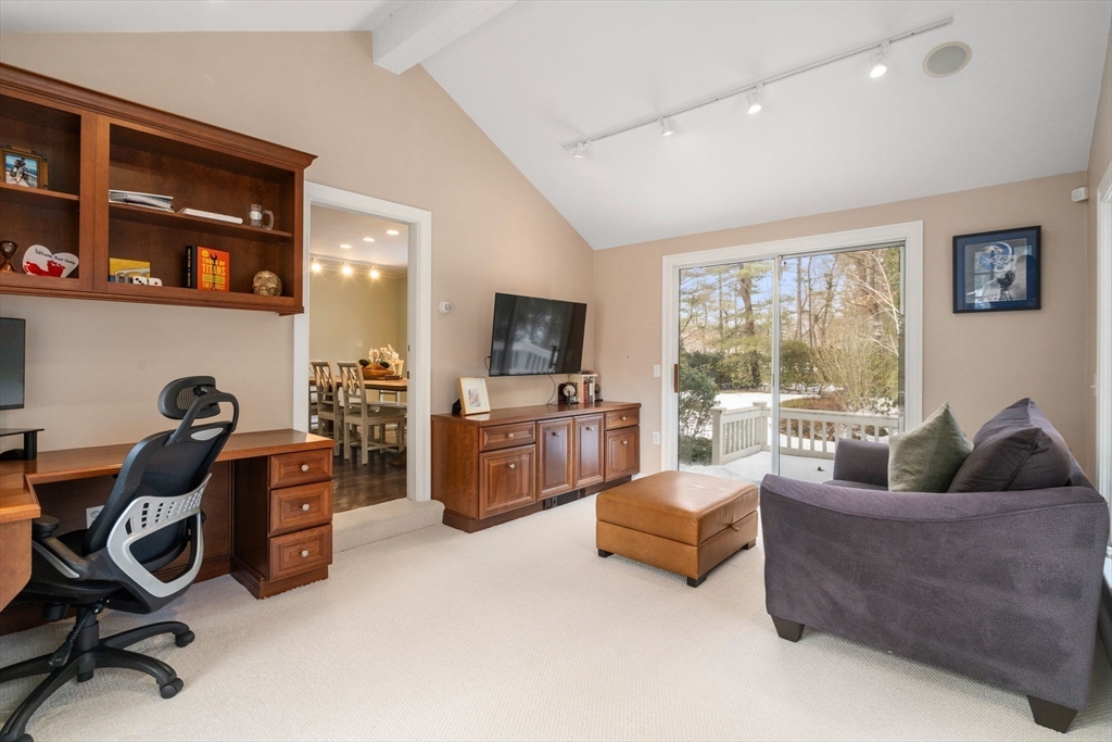 20 Windsor Road Needham, MA 02492 - Photo 11 of 29 a living room with furniture and a flat screen tv