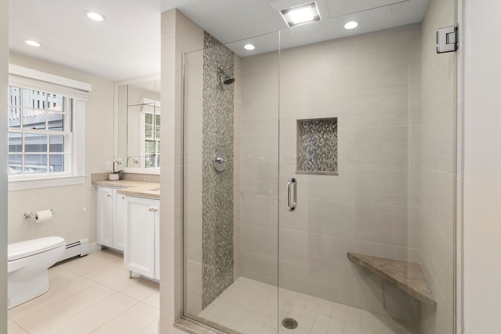 20 Windsor Road Needham, MA 02492 - Photo 23 of 29 a bathroom with a granite countertop sink a toilet and shower