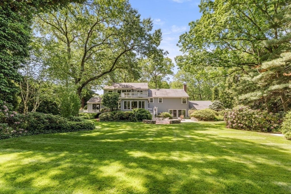 20 Windsor Road Needham, MA 02492 - Photo 25 of 29 a yellow house in middle of the forest