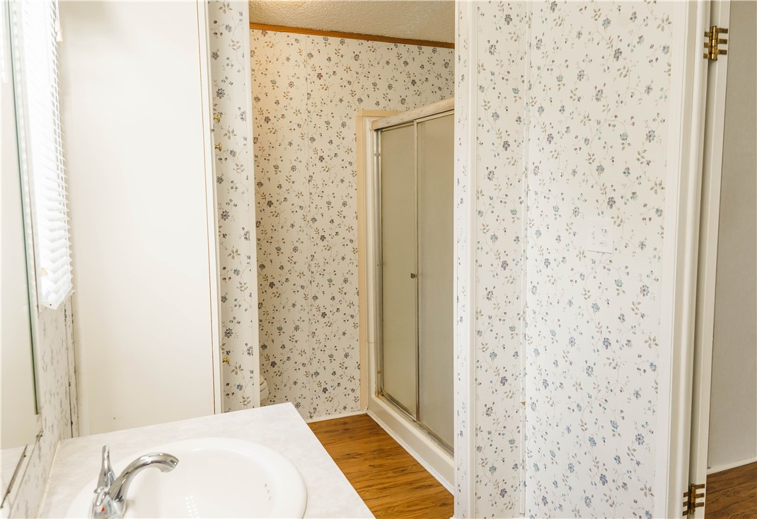 207 Dunbar Street Refugio, TX 78377 - Photo 25 of 39 Primary walk in shower