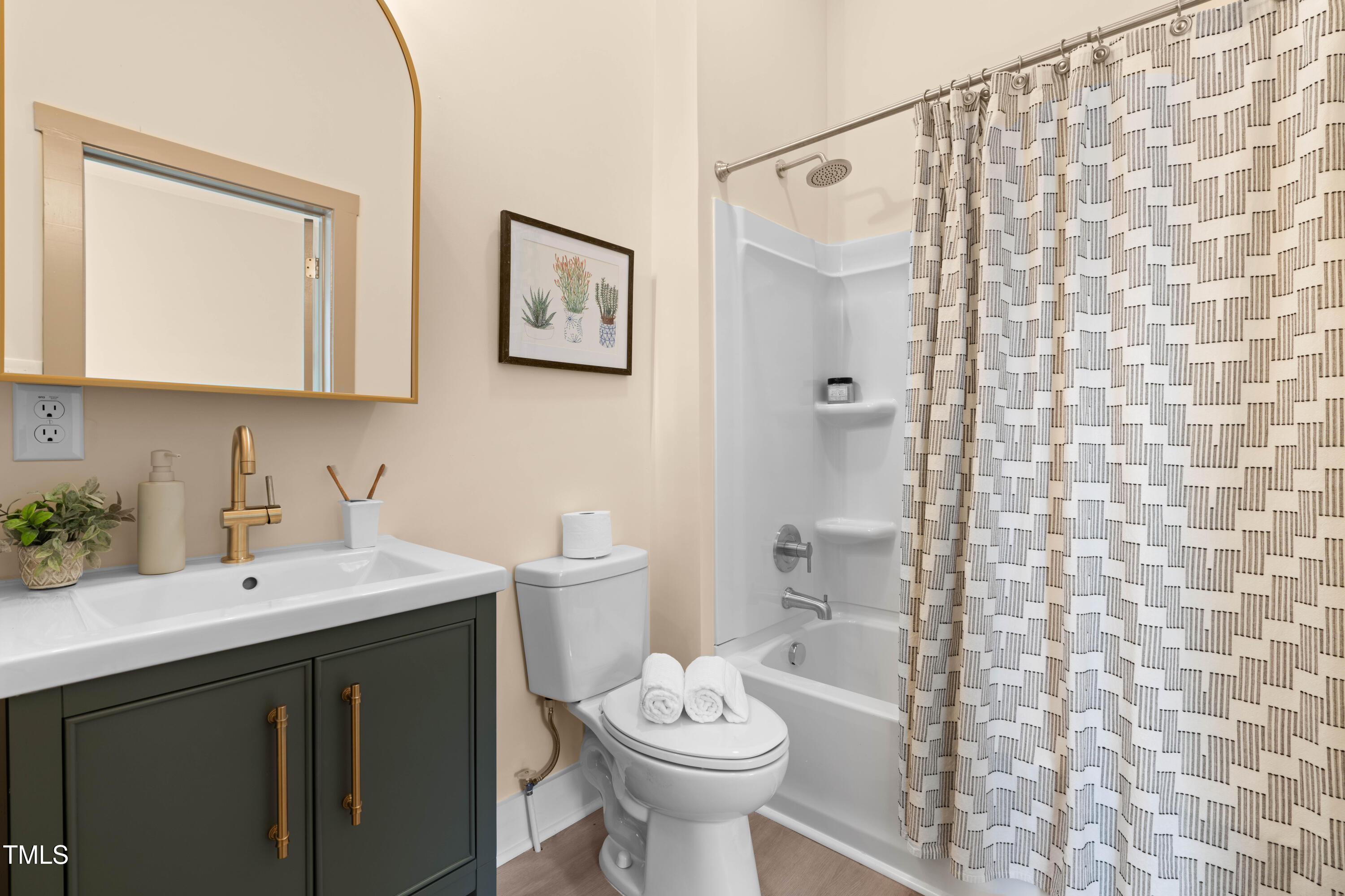 314 Bledsoe Avenue Raleigh, NC 27601 - Photo 15 of 21 a bathroom with a sink and a mirror