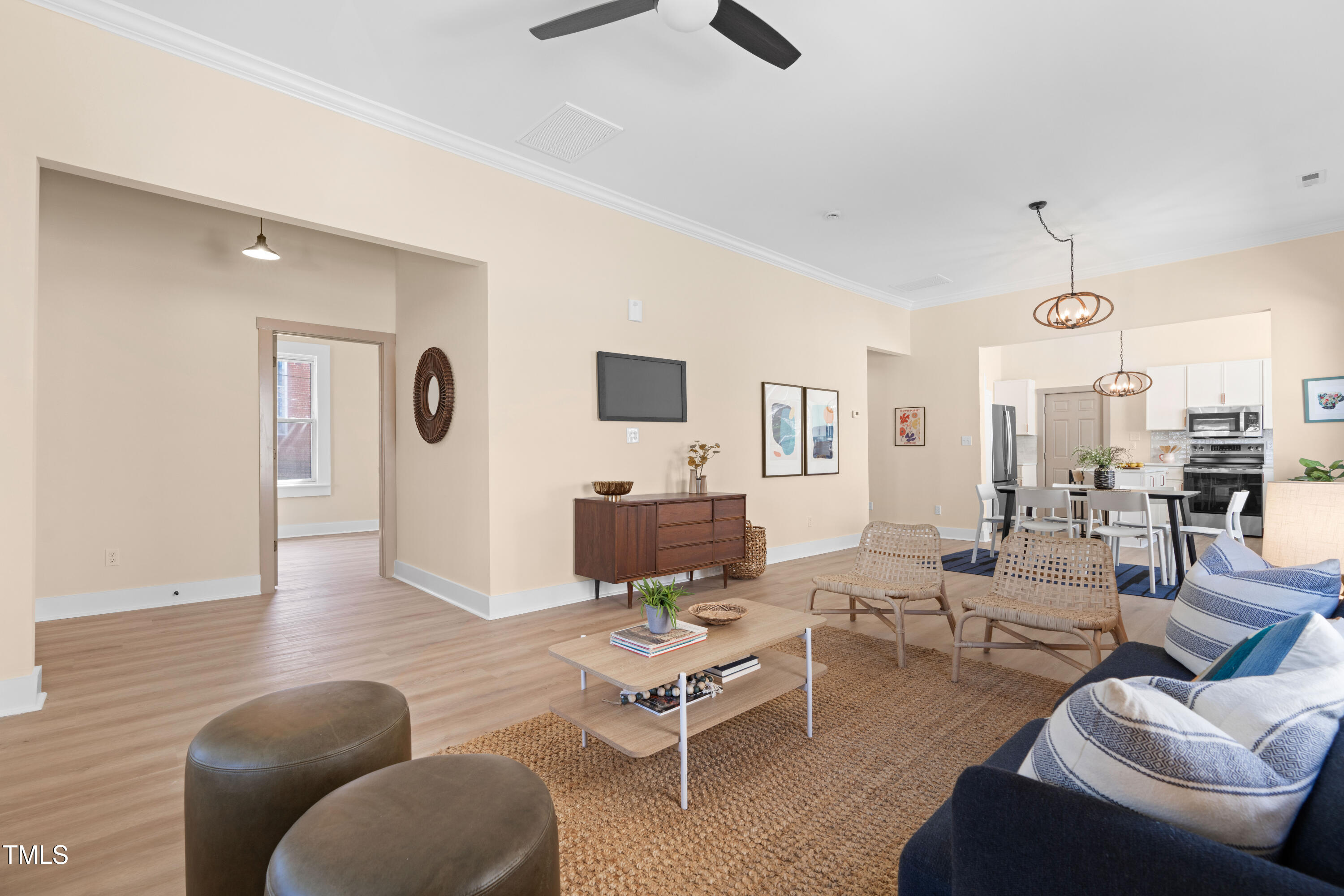 314 Bledsoe Avenue Raleigh, NC 27601 - Photo 3 of 21 a living room with furniture wooden floor and ceiling fan