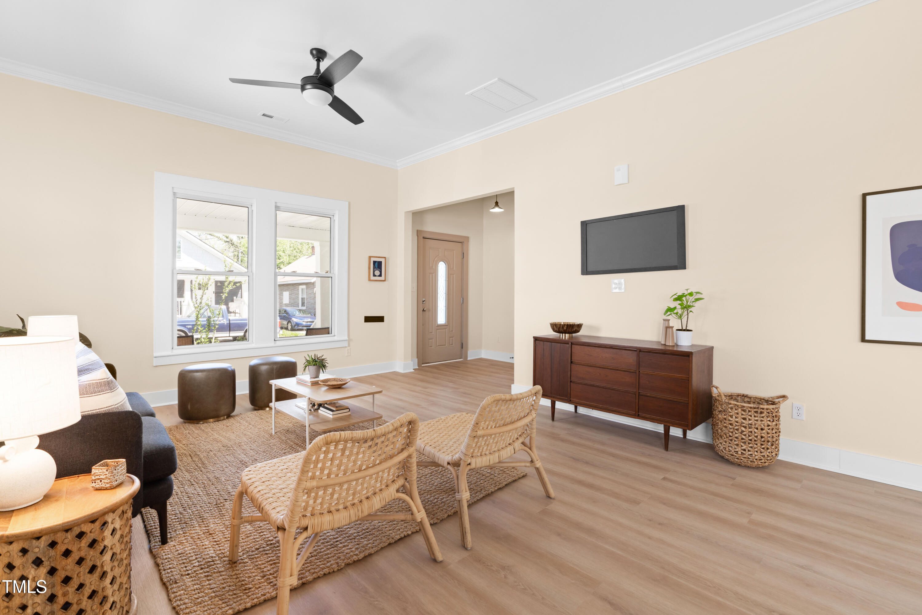 314 Bledsoe Avenue Raleigh, NC 27601 - Photo 5 of 21 a bedroom with a bed and wooden floor