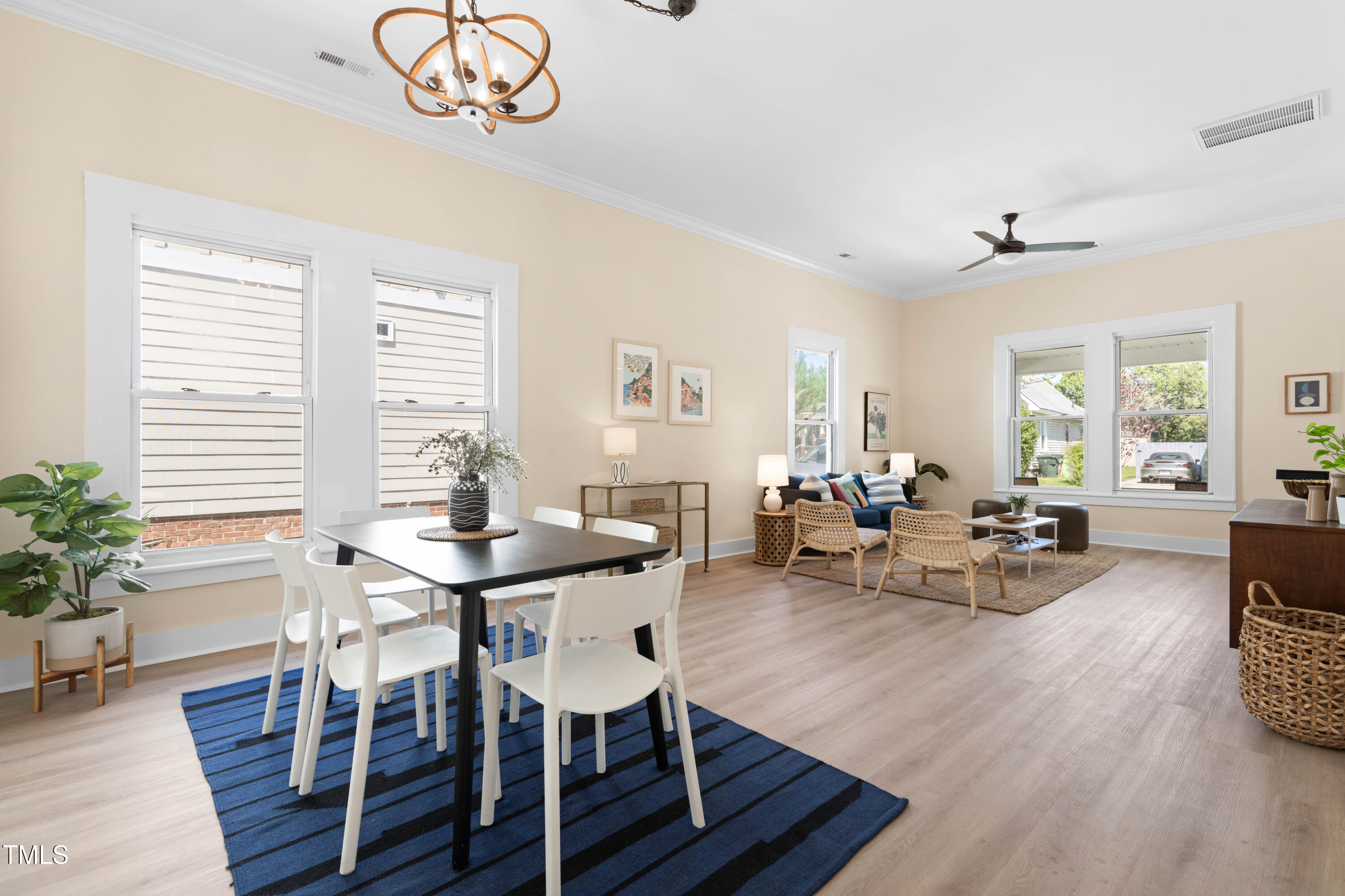 314 Bledsoe Avenue Raleigh, NC 27601 - Photo 6 of 21 a view of a dining room with furniture window and wooden floor