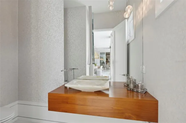 a bedroom with furniture and a rug