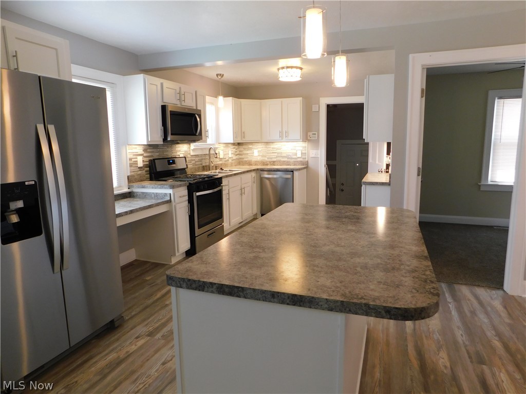 1227 Copley Road Akron, OH 44320 - Photo 11 of 35 View of kitchen and island eat-in bar