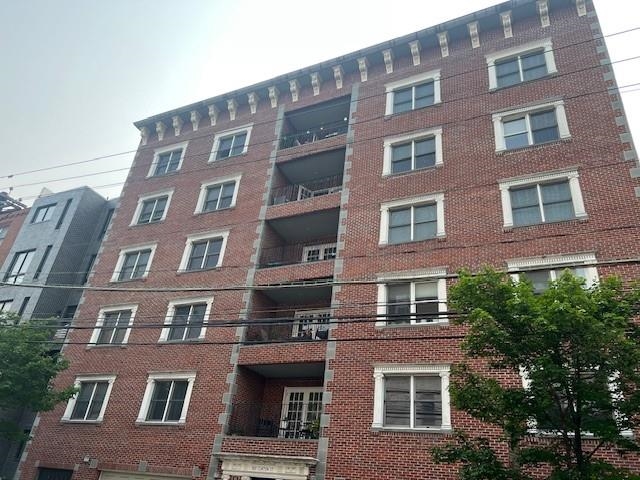 1031 Clinton Street, Unit 5B Hoboken, NJ 07030 - Photo 14 of 17 a front view of a building