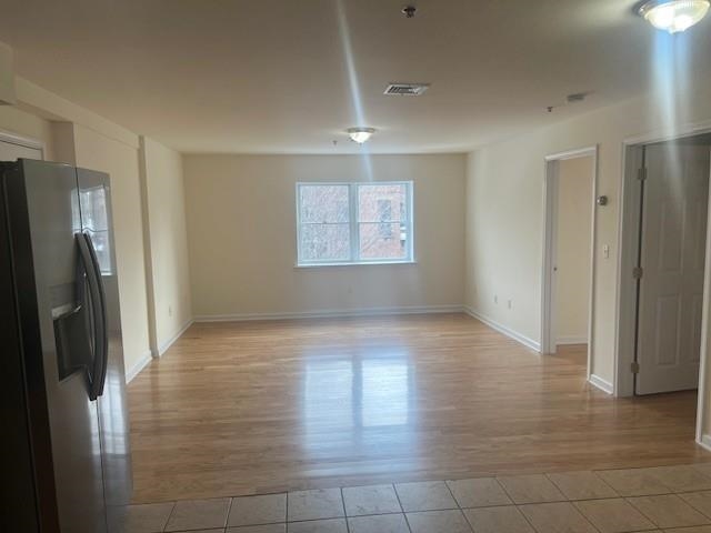 1031 Clinton Street, Unit 5B Hoboken, NJ 07030 - Photo 3 of 17 a view of an empty room with a window
