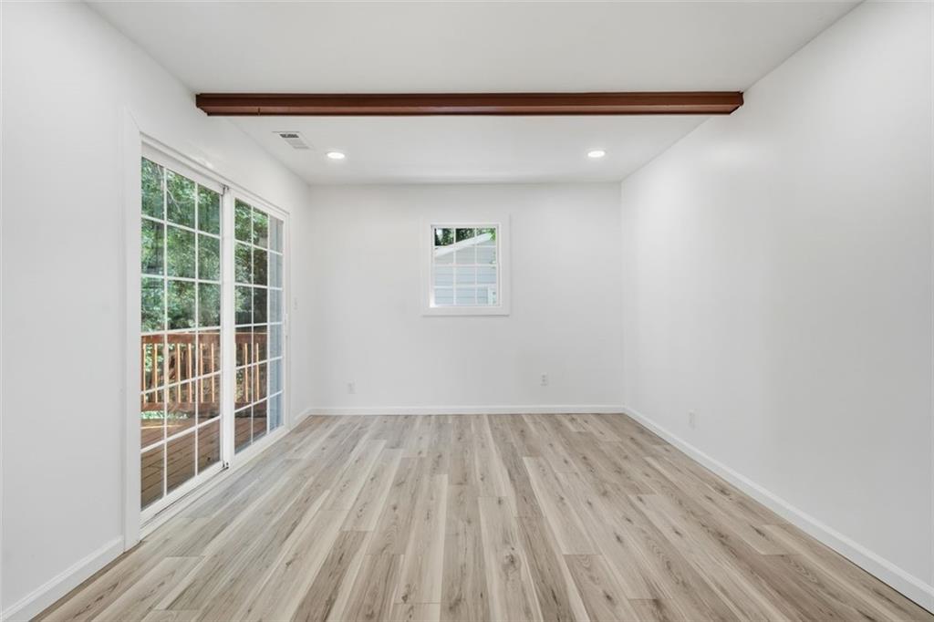 3920 Wedgefield Circle Decatur, GA 30035 - Photo 13 of 23 a view of empty room with wooden floor and fan