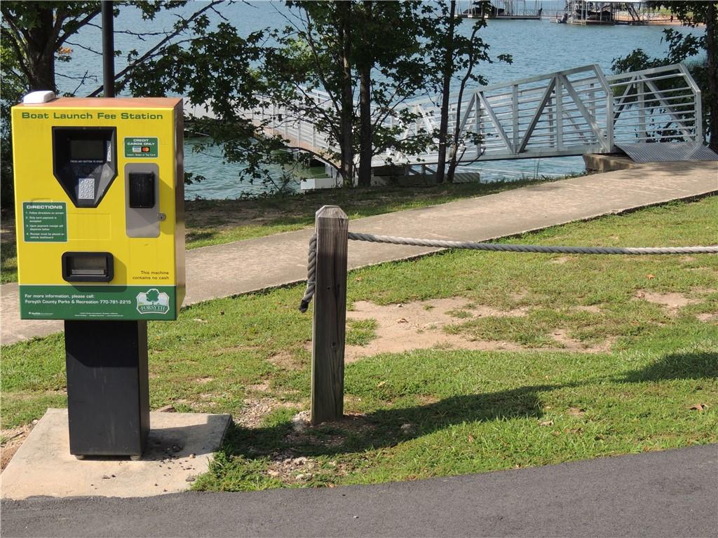 0 Indian Knoll Road Cumming, GA 30041 - Photo 26 of 37 a front view of a house with a yard