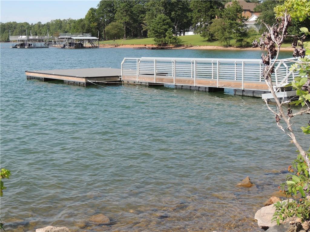 0 Indian Knoll Road Cumming, GA 30041 - Photo 27 of 37 a view of a house with a yard