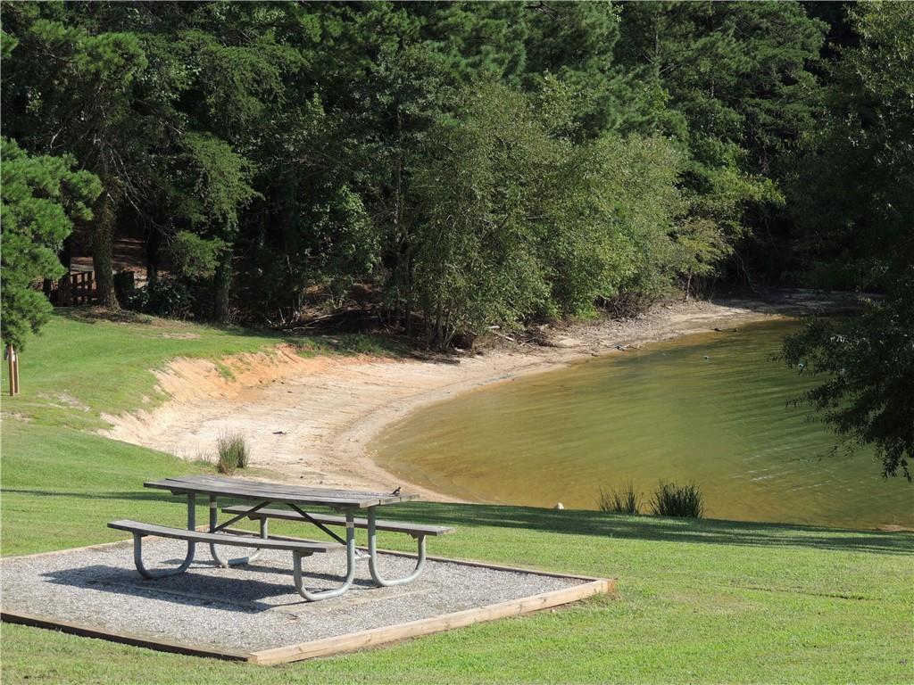 0 Indian Knoll Road Cumming, GA 30041 - Photo 33 of 37 a view of a lake with outdoor space