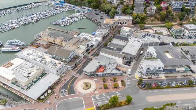 an aerial view of a house with outdoor space
