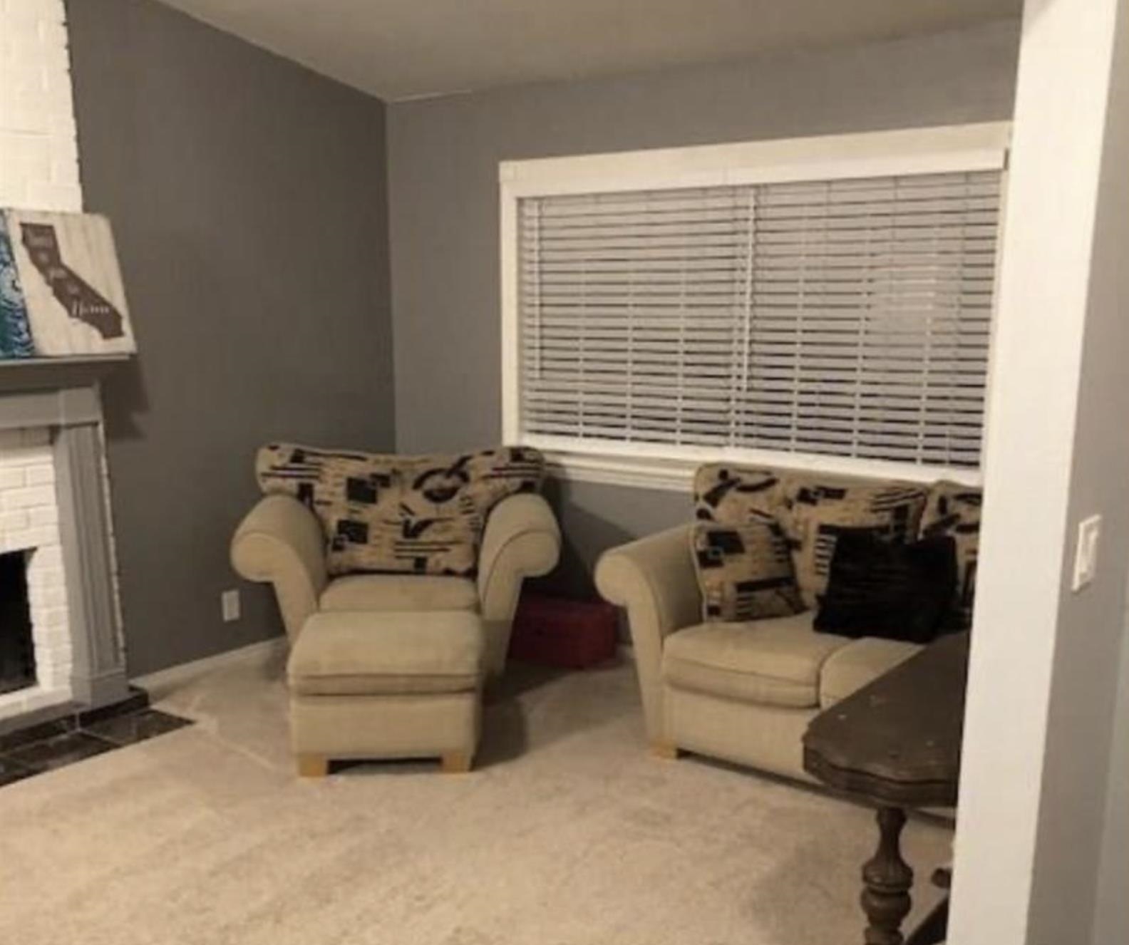 5250 Riverlake Road Discovery Bay, CA 94505 - Photo 10 of 18 Carpeted living area featuring a brick fireplace