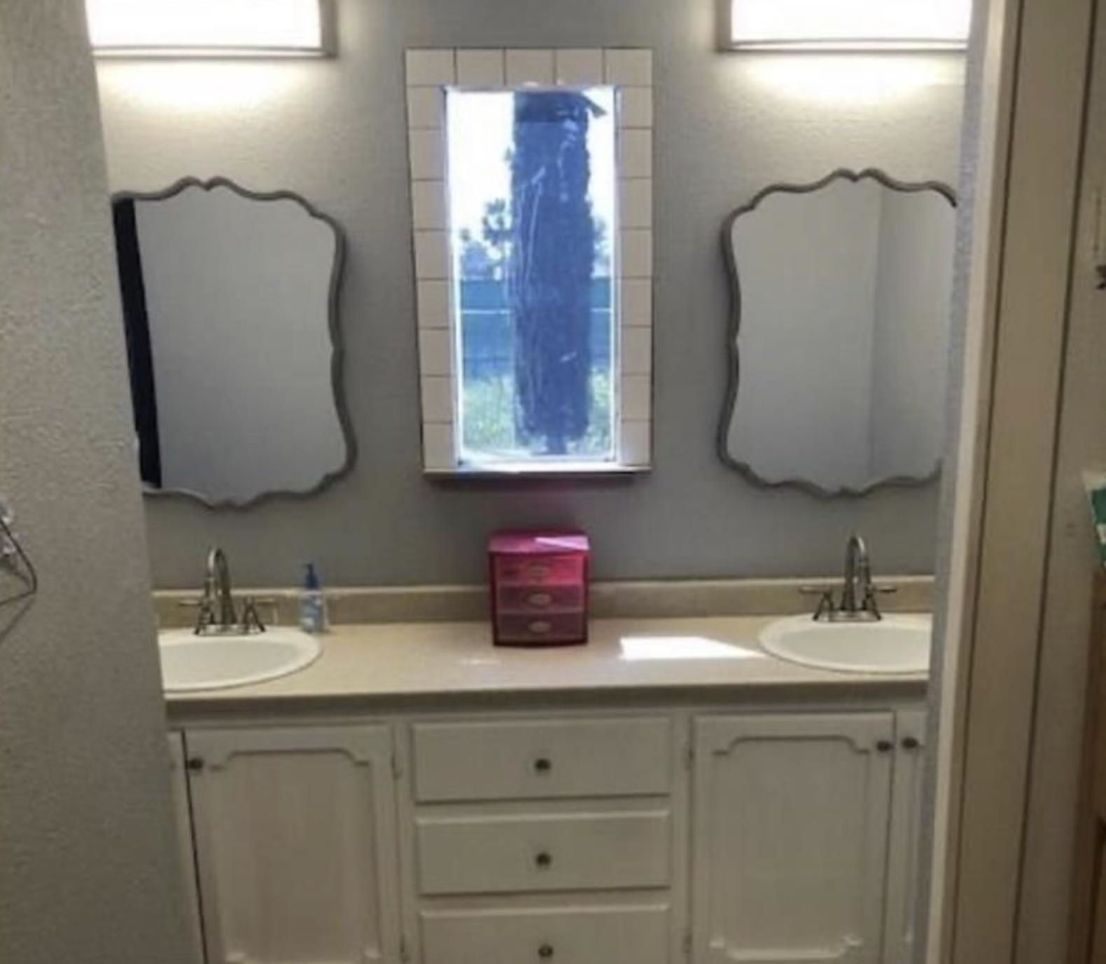 5250 Riverlake Road Discovery Bay, CA 94505 - Photo 12 of 18 Full bathroom with double vanity and plenty of natural light