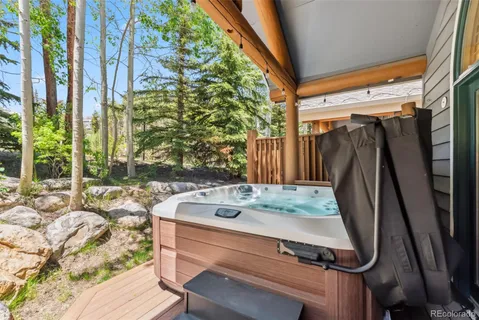 a view of a balcony with wooden fence