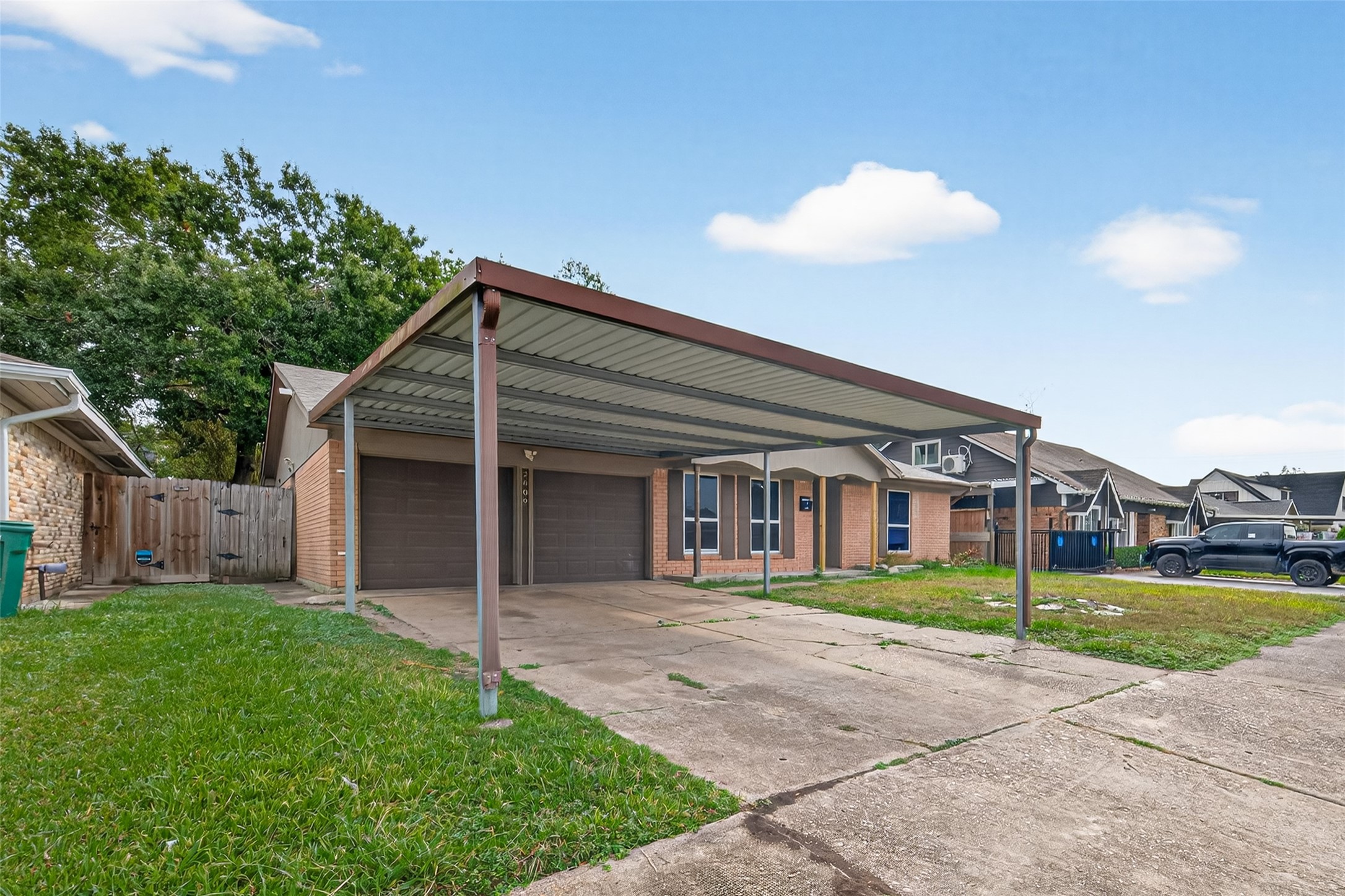 2609 Raspberry Lane Pasadena, TX 77502 - Photo 2 of 40 front view of a house with a yard