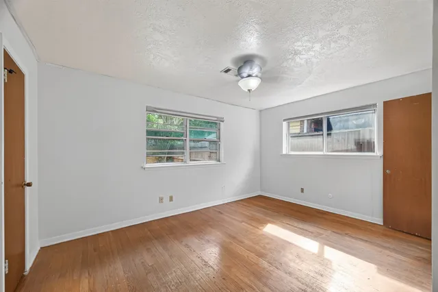 a view of a room with a large window